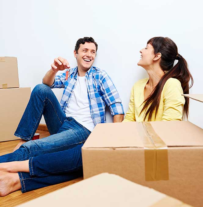 Happy couple after a successful move with Liberty Moving in Birmingham, AL, showcasing the company's reliable and professional moving services.