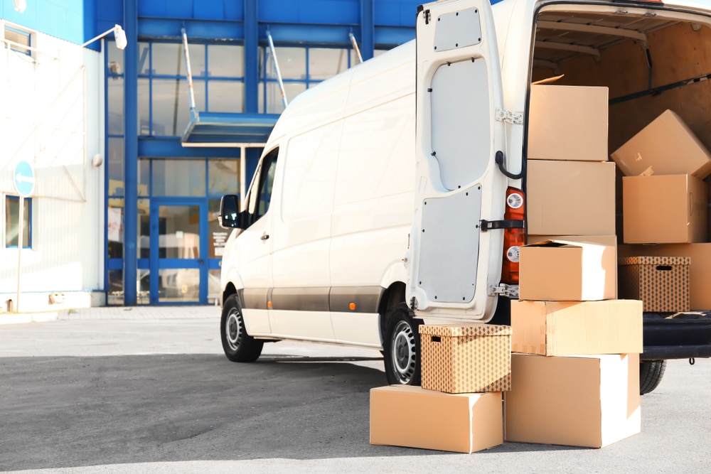 Liberty Moving providing well-packed boxes and professional packing services, ensuring items are securely transported with care.