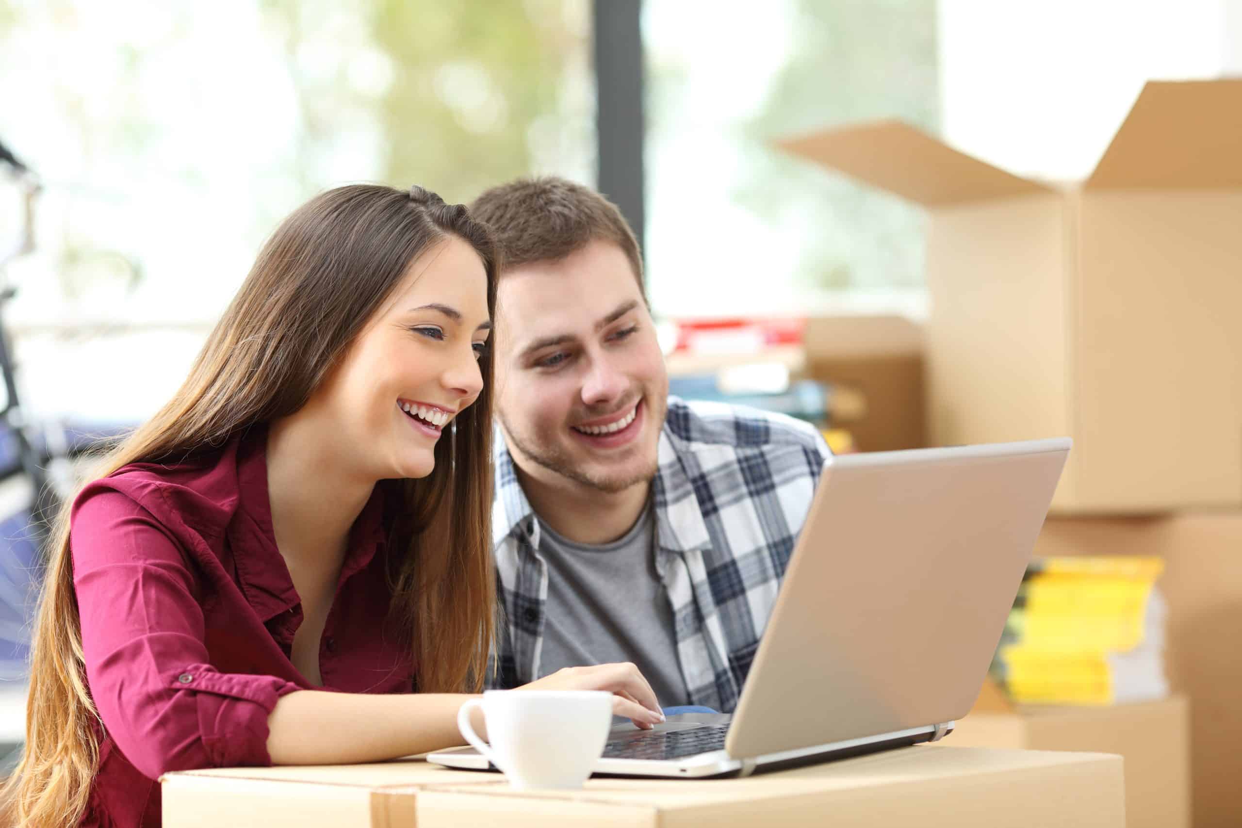 A fulfilled couple with joy and gratitude after a hassle-free move with Liberty Moving, offering professional and timely moving services in Birmingham, AL.